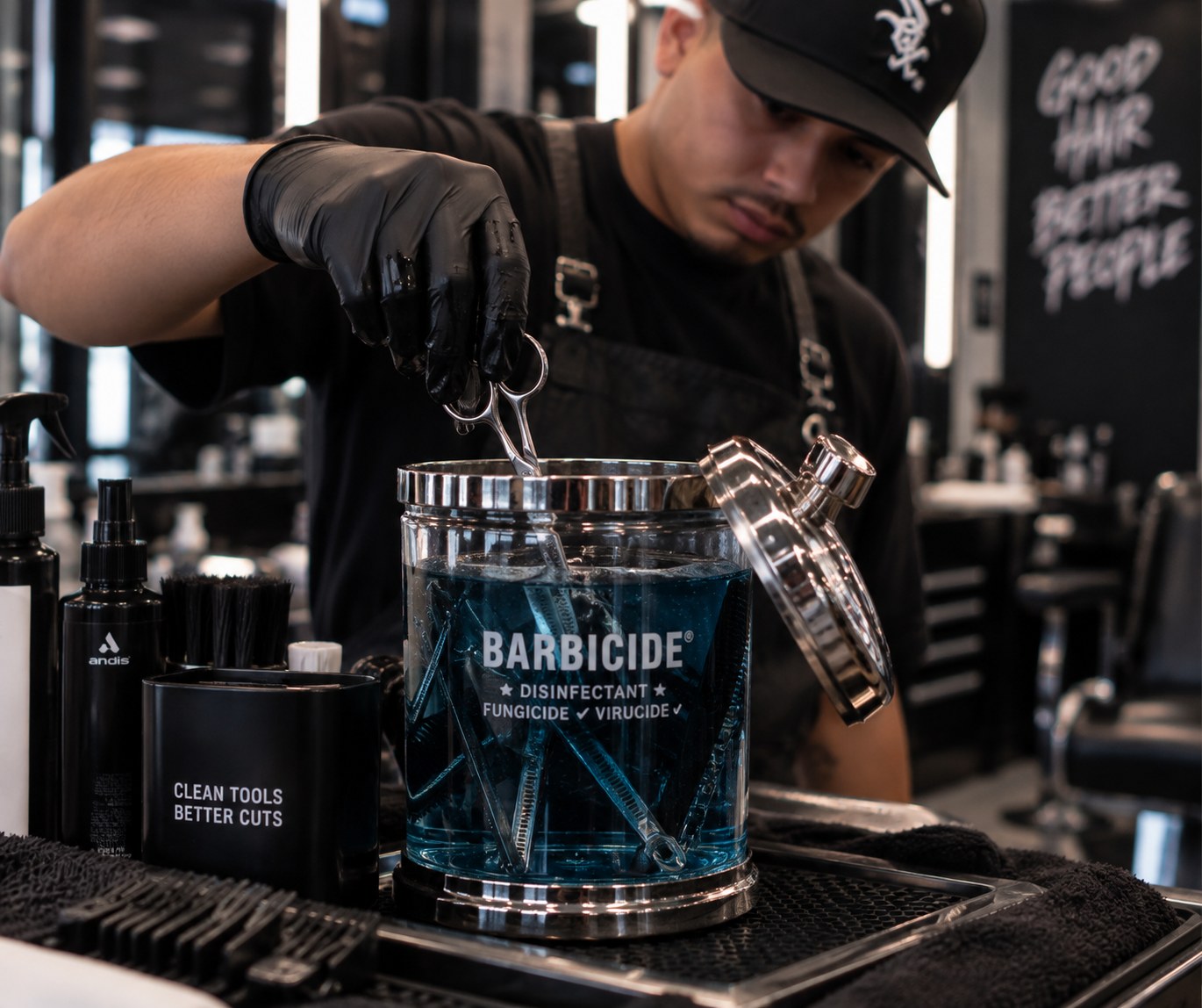 Clean shears and tools sanitizing in Barbicide