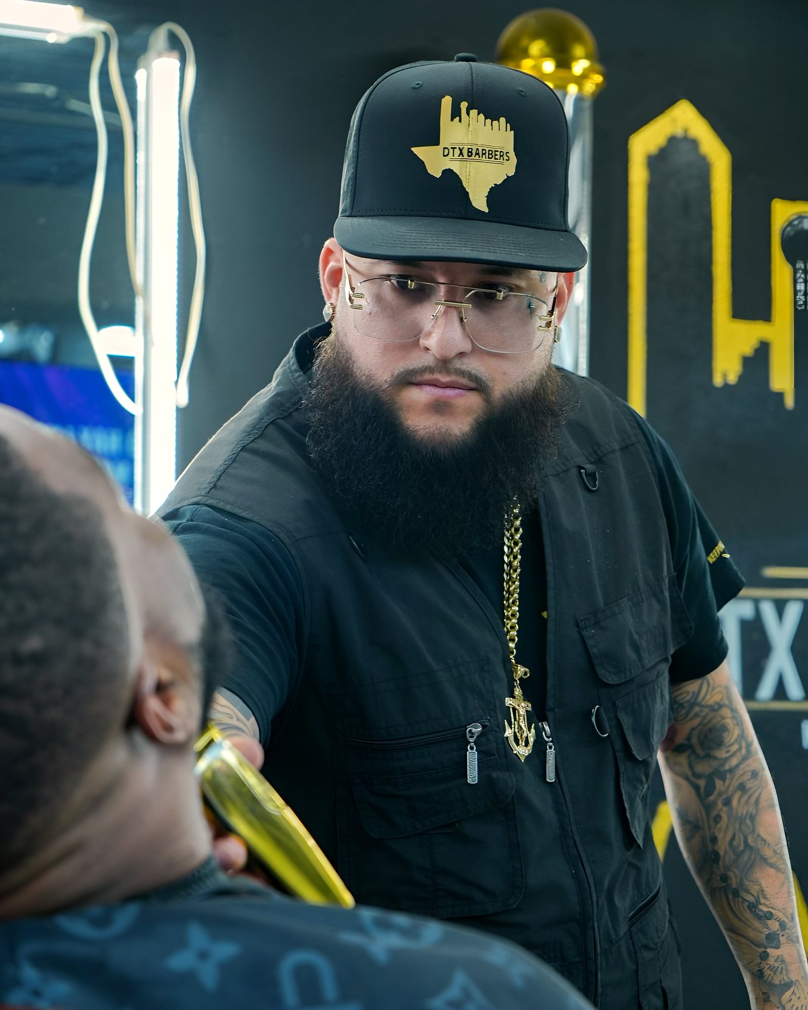 Macario Mike Robles, founder and lead instructor of DTX Barber Academy